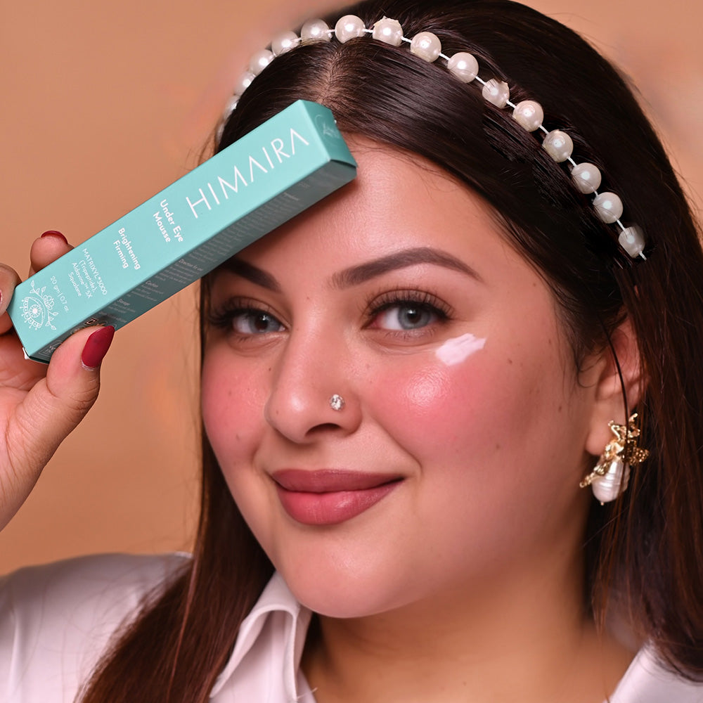A woman with a pearl headband holds a box of Himaira&