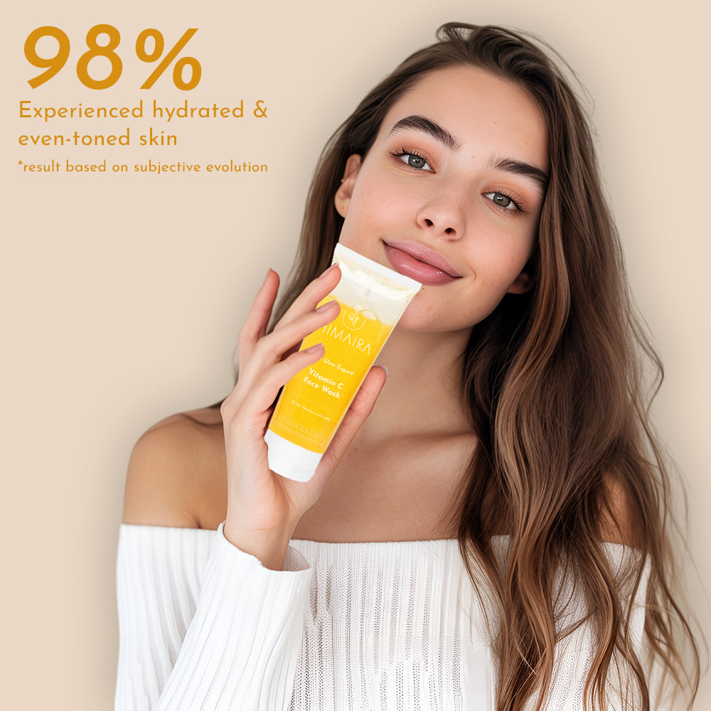 Women holding best vitamin c face wash in her hands with text displayed "98% Experienced hydrated & even-toned skin"